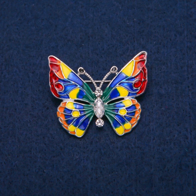 Brooch Butterfly with white crystals and multicolored enamel, golden metal 31x37mm