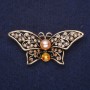 Brooch Butterfly with Yellow Stones and Pearl Bead 55x25mm Yellow Metal
