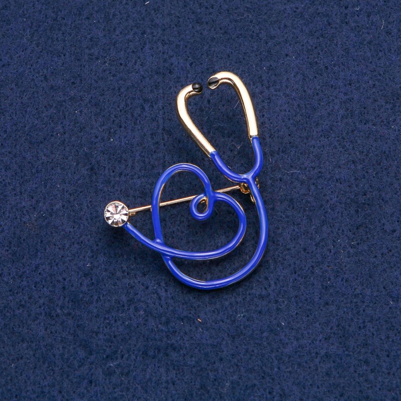Brooch blue Stethoscope with heart, white stone, golden metal 43×33mm