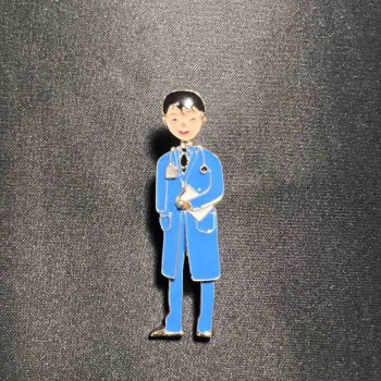 Brooch 'Med brother' with blue enamel, golden metal 17x62mm