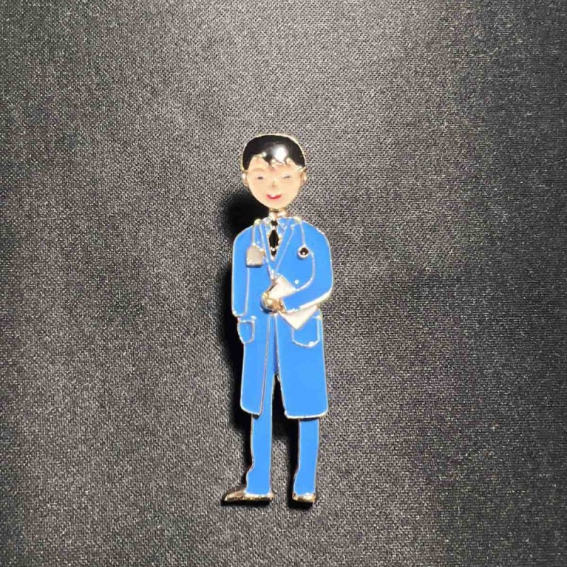 Brooch 'Med brother' with blue enamel, golden metal 17x62mm