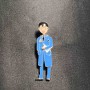 Brooch 'Med brother' with blue enamel, golden metal 17x62mm