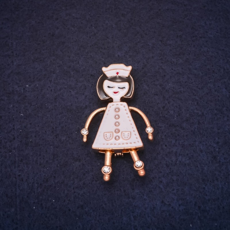 Brooch Nurse enamel white color 42x26mm golden metal