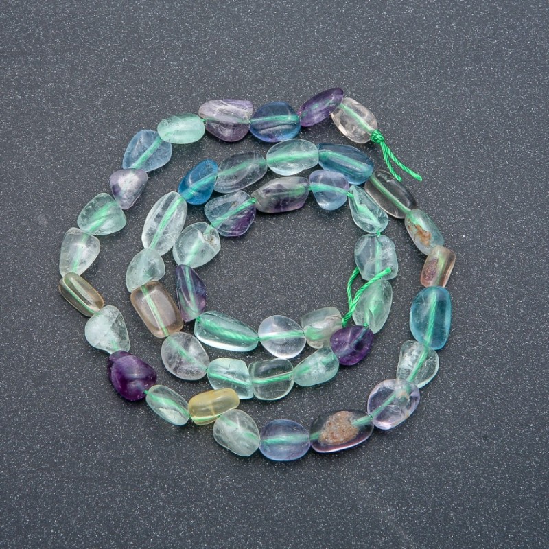 Fluorite faceted round beads on thread, diameter 7x9mm, length 39cm +