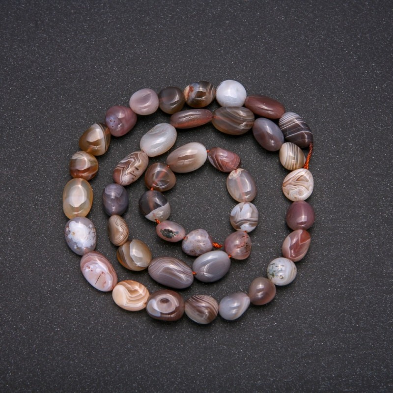 Botswana agate faceted round beads on a thread, 10x8 mm, length 40 cm