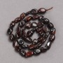 Beads on a Thread of Natural Stone Tiger's Eye Tumbled, 10×8 mm diameter + -, length 39 cm +