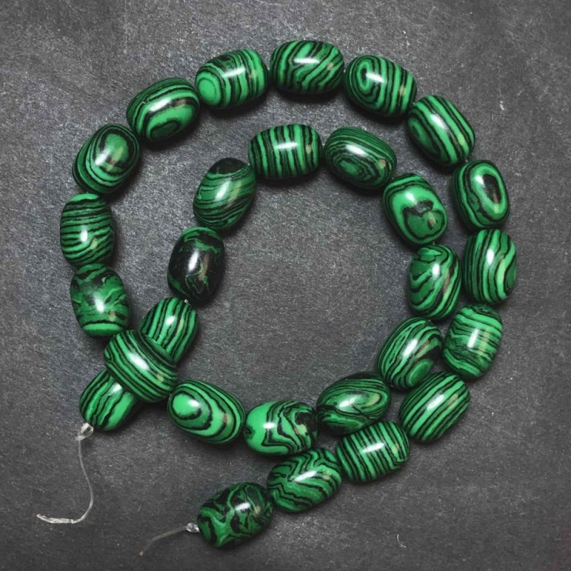 Malachite Beads on Threaded String (pressed), diameter 10×14 mm + -, length 39 cm +
