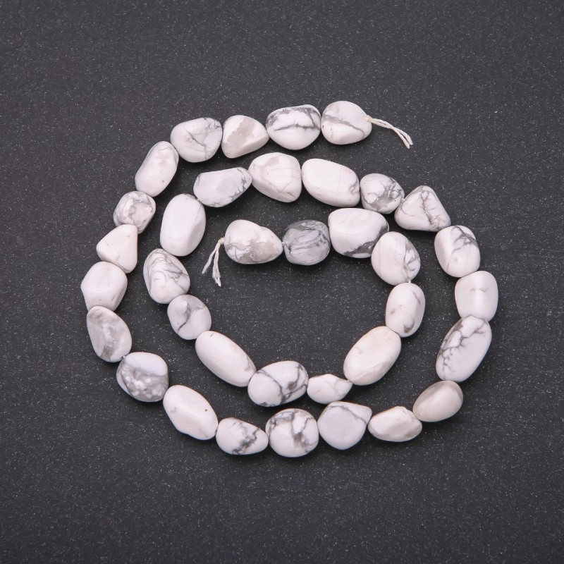 Howlite beads on a thread, tumbled, diameter 8×11 mm (+/-), length 38 cm