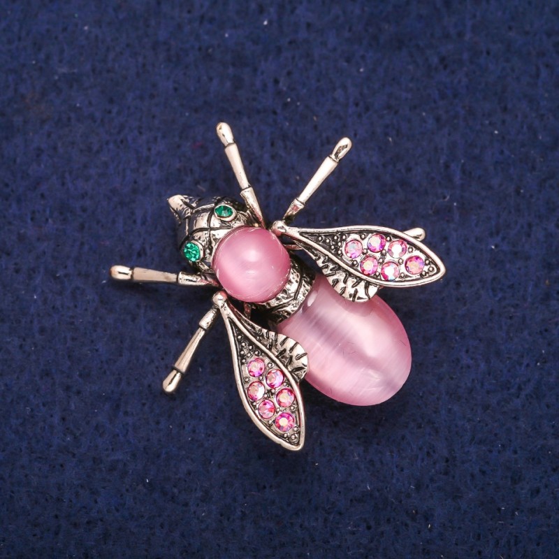 Brooch Butterfly with Pink Cat's Eye and Rhinestones 33x34mm, metal with a golden sheen