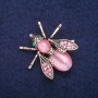Brooch Butterfly with Pink Cat's Eye and Rhinestones 33x34mm, metal with a golden sheen