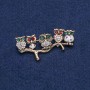 Brooch Owl in golden metal with white, Chadon, red and green crystals and halochosium 52x33mm +