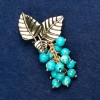Brooch with Variscite Stone "Branch with Berries", gold-tone metal 60x35mm