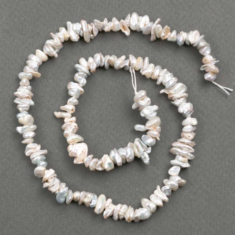 Baroque Pearl Thread - seed beads with a petrol tint, diameter 6×1-3mm, length 39cm+