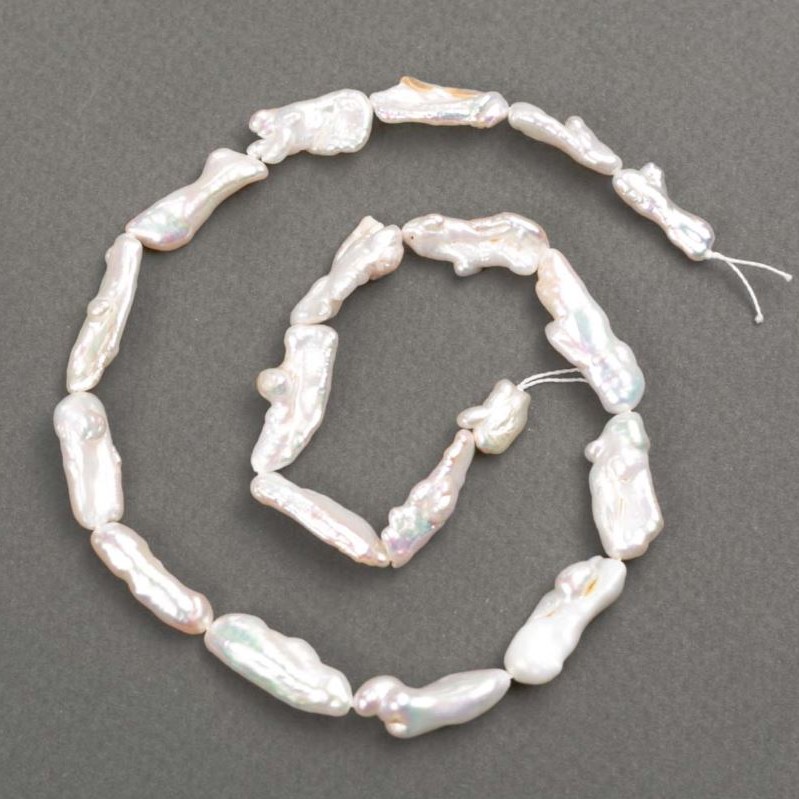 Baroque Pearls with Petroline Hue on Thread d 7-9×10-23mm +-, length 38cm+