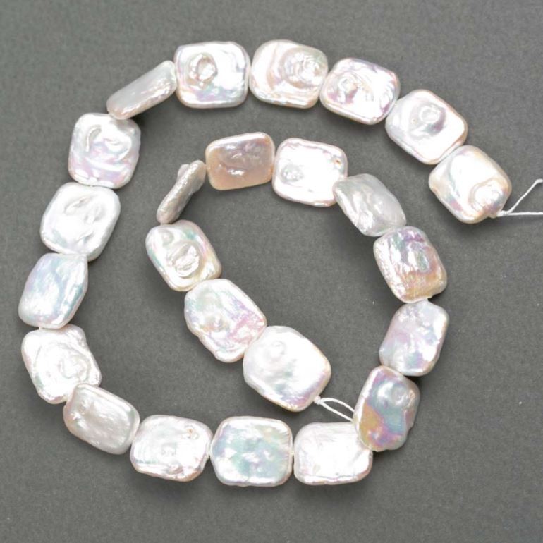 Baroque pearls with petrol-like shade on a thread d 15-17×13-16mm +-, length 38cm+