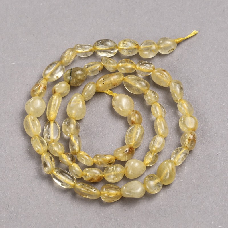 Rutilated Quartz Faceted Beads on Thread, 8x6 mm ±, length 39 cm ±