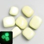 Natural Onyx that glows in the dark, tumbled 25×17mm (+-) packaged 100 g, green glow