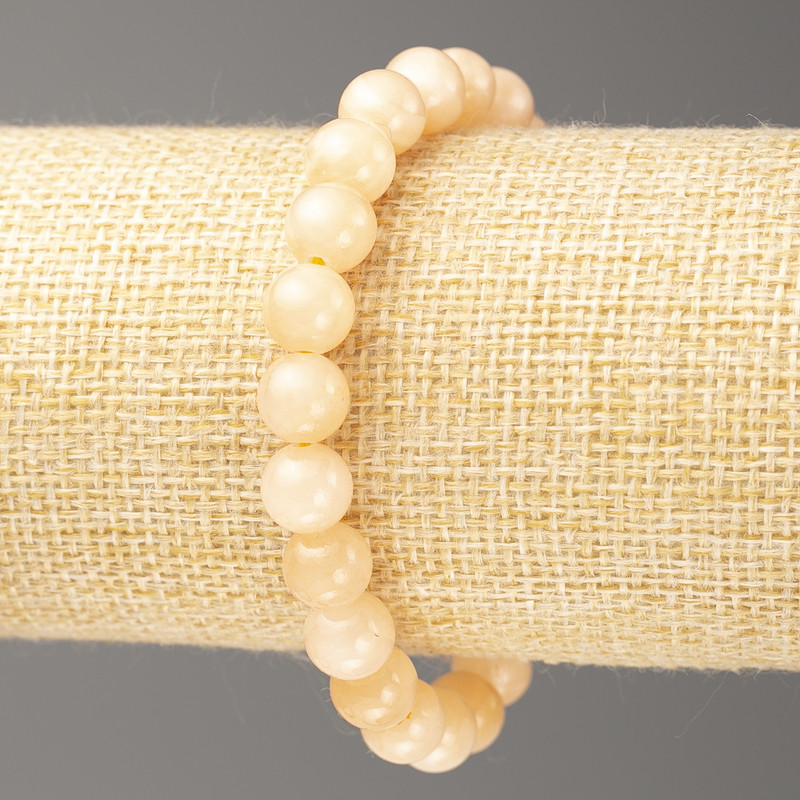 Bracelet Selenite (artificial acrylic), 8mm diameter ±, length 18cm ± smooth bead on elastic