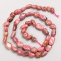 Rhodonite Beads on a Thread, tumbled, natural stone, 7x9-6x7 mm +-, length 40 cm
