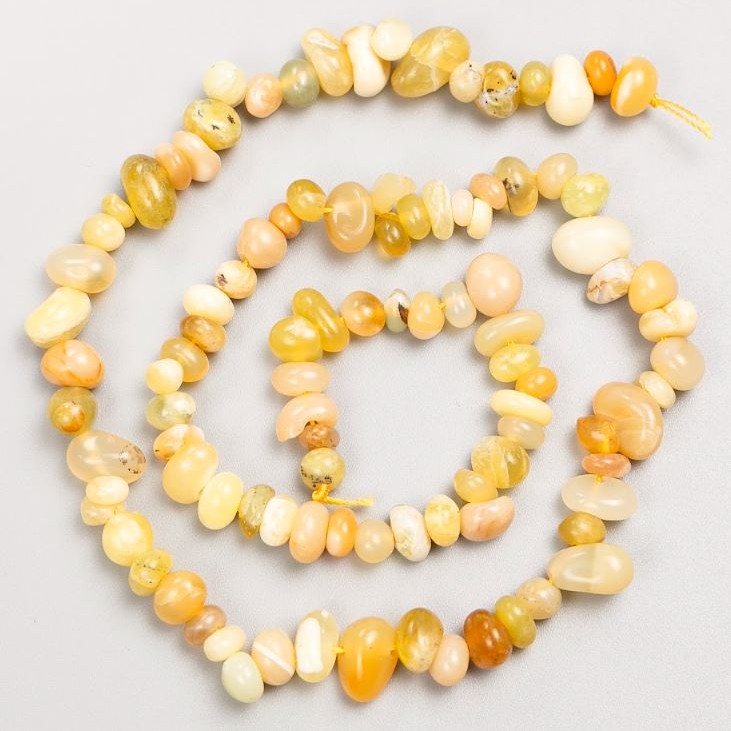 Beads on Thread of Natural Stone Yellow Agate Tumbled d 7×5mm+-, length 41cm+