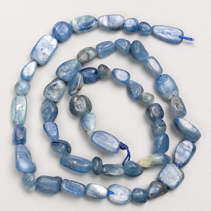Kyanite Beads on a Thread, Tumbled, d 8×11–6×7 mm +/-, length 40 cm +