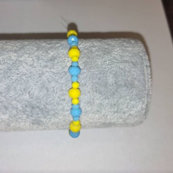 Bracelet "Ukraine" with Czech crystal "faceted rondelle" on elastic, diameter 6x4 mm +-, diameter 3x2 mm +-, length 18 cm+-