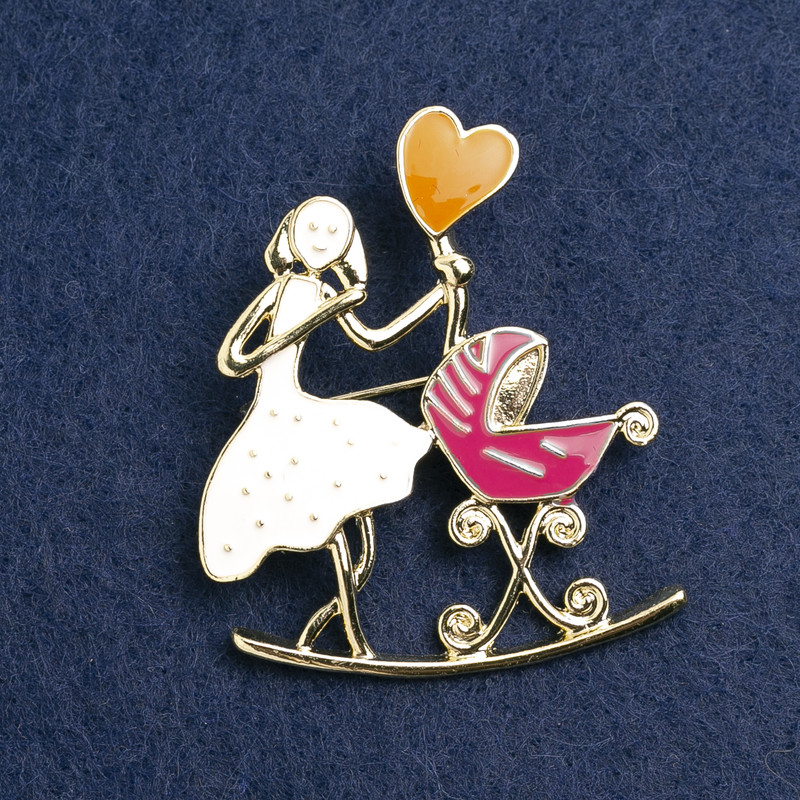 Brooch 'Mom with a Cradle', white enamel, raspberry enamel, golden metal 46x38mm