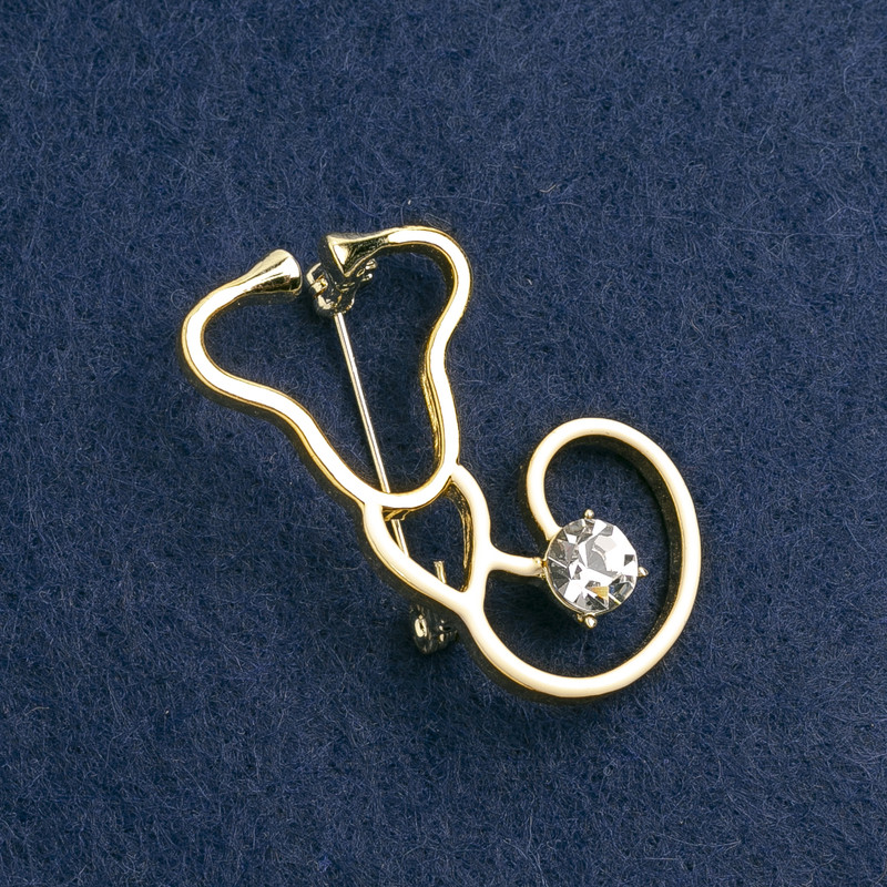 Brooch Scoping Stethoscope enamel white, with white stone, golden metal 42x25mm