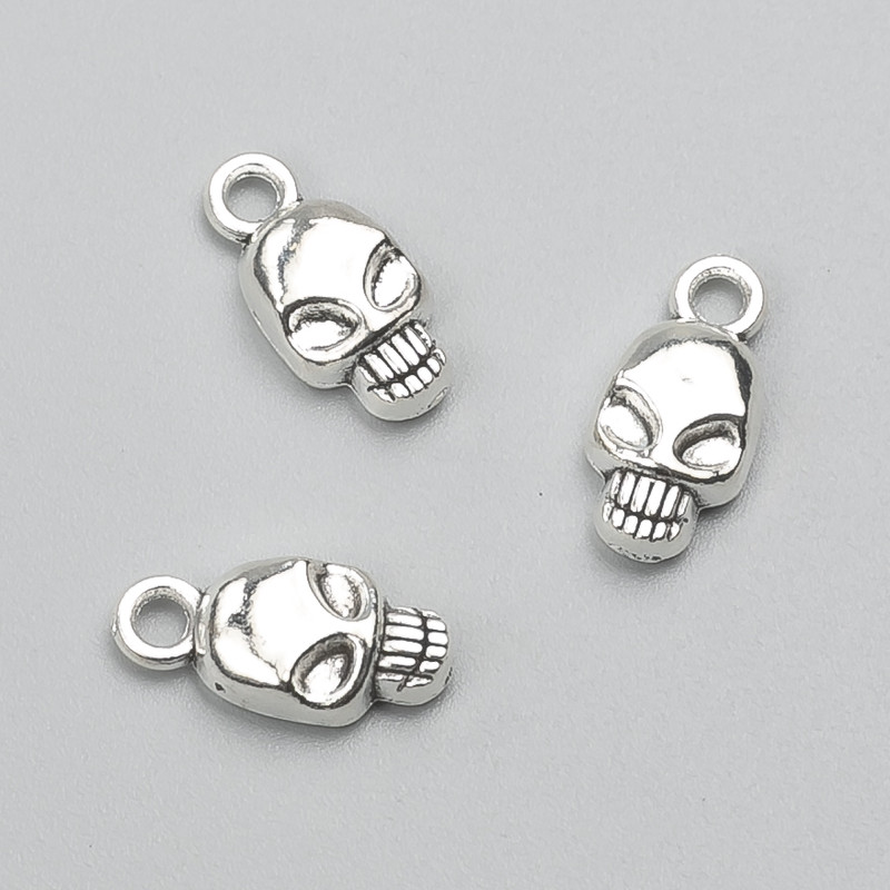 Pendant Findings Skull 15x7 mm packaging 20 pcs +-. 20 grams