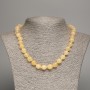 Necklace Pale Yellow “Moonstone” Smooth Beads, 8mm dia. ±, 50cm length ±, made of white nephrite-like synthetic stone (painted)