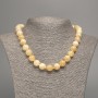 Necklace Pale Yellow “Septarian” smooth bead, diameter 12mm ±, length 50cm ±, made of white jade (synthetic dyed)