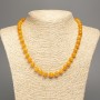 Necklace Amber-orange beads smooth ball diameter 8mm±, length 50cm±, made of white jade (synthetic dyed)