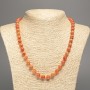 Necklace of Orange Coral, smooth beads, 8mm diameter, length ~50cm, made of white jade (synthetic dyed)