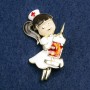 Brooch Nurse, white, black, and red enamel, gold-colored metal 42x31 mm