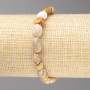Bracelet with Fossilized Coral Beads, faceted, diameter 7x10mm± on elastic, length 18cm+