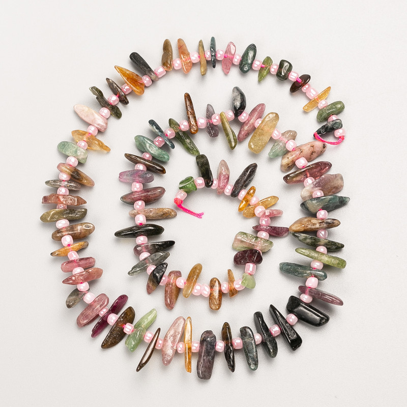 Turmaline natural stone fragment "Needle" on a thread, diameter 14×4–7×2mm±, length 40cm± with beads, diameter 3mm