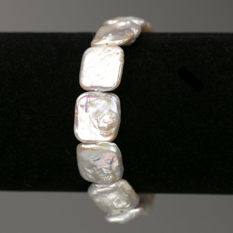 Bracelet with Baroque Pearls, rectangular shape, color tone “gasoline”, diameter 14x16mm±, length 18cm± (elastic)