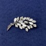 Brooch Branch of White Cat's Eye, white crystals, silver metal, diameter 50×27mm+