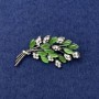 Brooch Branch of Green Cat's Eye, White Crystals, Silver Metal, diameter 50x27mm+