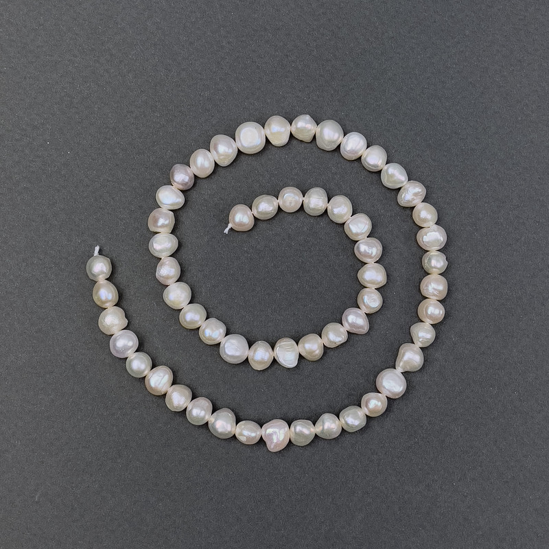 Freshwater pearls with a petrol indigo hue on a thread, diameter 5–6 mm, 36 in length (36 cm)