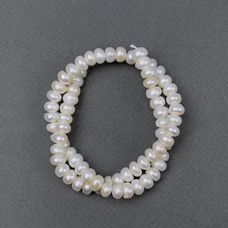Freshwater oval pearls on a thread, 8x5 mm ±, length 37 cm ±