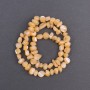 Beads with Peach Tin: Mother-of-Pearl Turquoise Beads 8x6 mm, multi-tone, 41 cm long on cord