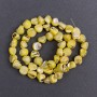 Toned beads—Yellow mother-of-pearl faceted, 8×6 mm, ~ 41 cm on thread