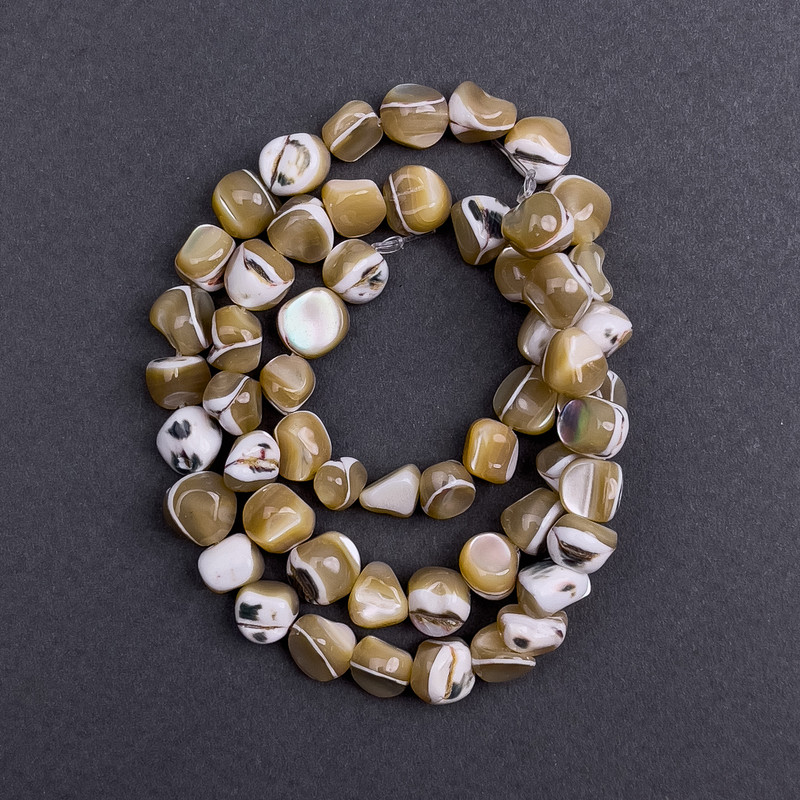 Toned Mother-of-P pearl Beads Beige Faceted, diameter 8x6mm+-, length 41cm+- on thread