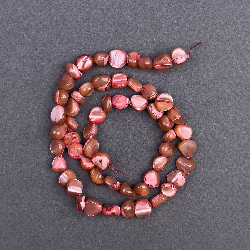 Toned mother-of-pearl beads brown faceted, 8x6 mm, +- length 41 in on fishing line