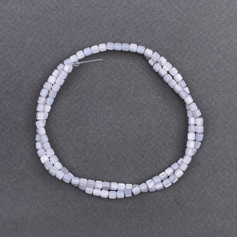 Gray Pearlized Faceted Cylindrical Beads, diameter 3.5 mm, length 40 cm, on Mono Thread