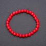 Bracelet made of natural coral on elastic with smooth beads, diameter 6(±)mm, length 18cm