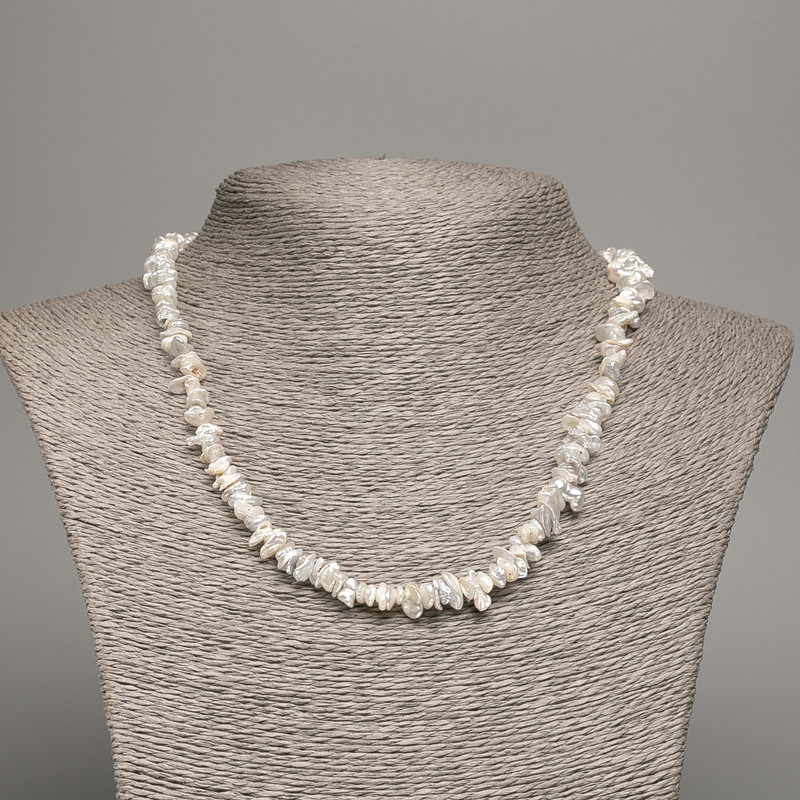 Necklace of natural baroque pearls with a petrol-toned shard, bead size 8x3mm, length 48cm +