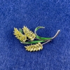 Brooch Seed Heads with pale yellow rhinestones, green enamel, silver metal, diameter 54×35mm+