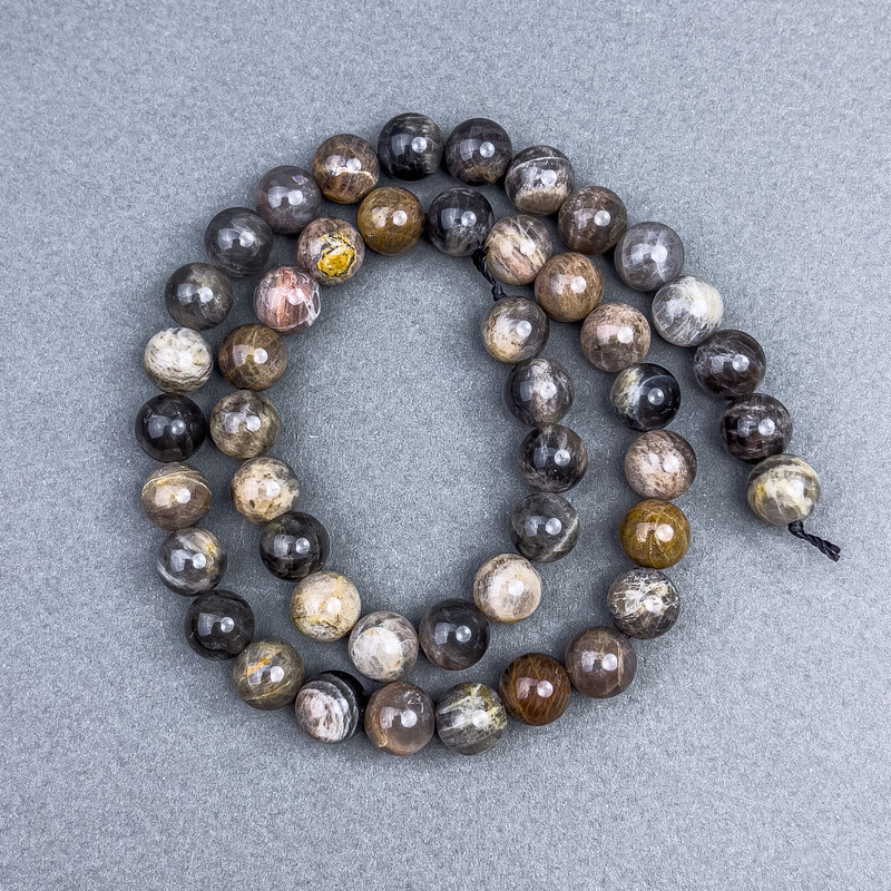 Sunstone Beads natural stone smooth ball diameter 8.5 mm on thread, length 39 cm+